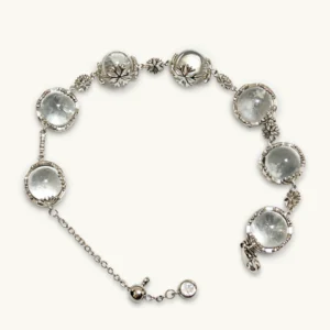Clear Quartz Healer & Clarity Snowflake Bracelet — natural quartz spheres and vintage snowflake details set in silver-plated copper by Meruisa Crystal