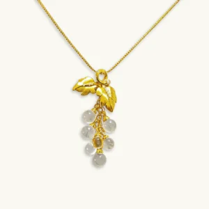 Clear Quartz Abundance & Clarity Grapevine Pendant — a cluster of natural clear quartz beads hanging from gold-plated sterling silver leaves with cubic zirconia accents, Meruisa Crystal