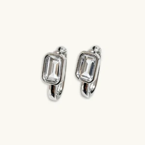 Sleek rectangular hoop earrings featuring a natural clear quartz, set in solid sterling silver by Meruisa Crystal