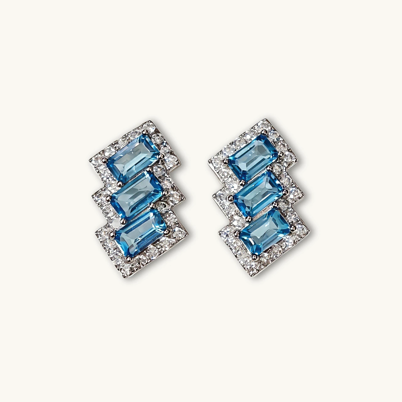 Blue Topaz · Clarity Stud Earrings Blue Topaz Clarity Stud Earrings — natural baguette-cut Blue Topaz set in sterling silver with pave accents by Meruisa Crystal