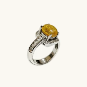 Golden Light Rutilated Quartz Prosperity Ring — natural cabochon Golden Rutilated Quartz with golden rutile strands set in sterling silver with square-cut accent stones by Meruisa Crystal