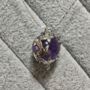 Amethyst Intuition & Wisdom Butterfly Pendant — natural amethyst sphere wrapped in silver-plated copper butterfly details by Meruisa Crystal