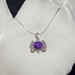 Cinderella's Wish Amethyst Pumpkin Carriage Pendant — natural 17.2mm brilliant‑cut Amethyst set in silver‑plated copper with lace filigree and micro‑pave diamonds by Meruisa Crystal