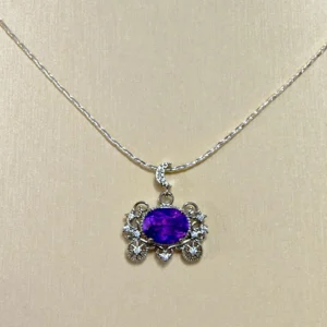 Cinderella's Wish Amethyst Pumpkin Carriage Pendant — natural 17.2mm brilliant‑cut Amethyst set in silver‑plated copper with lace filigree and micro‑pave diamonds by Meruisa Crystal