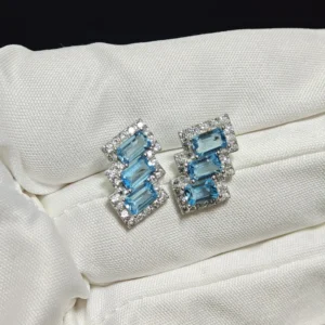 Blue Topaz Clarity Stud Earrings — natural baguette-cut Blue Topaz set in sterling silver with pave accents by Meruisa Crystal