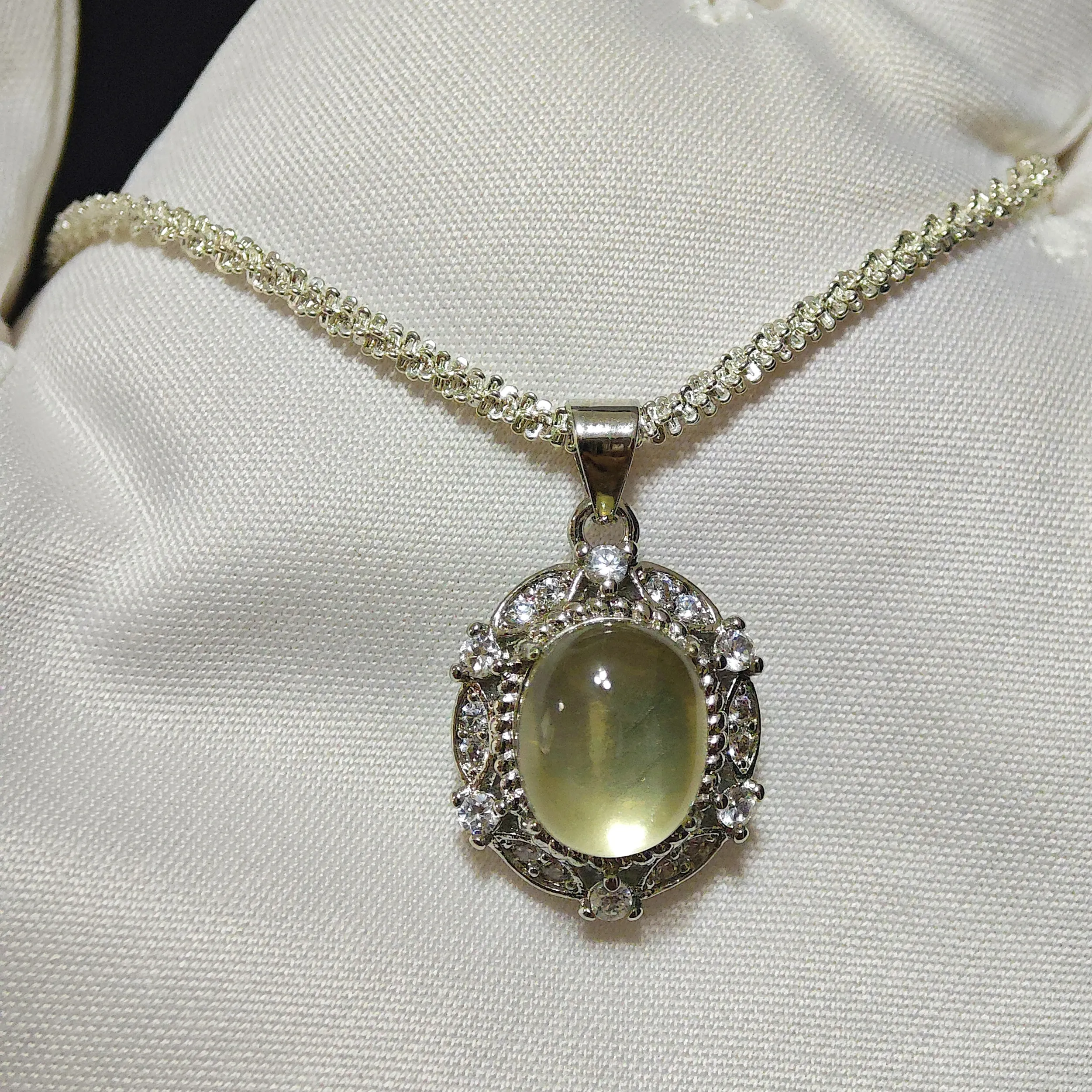 Citrine · Abundance Crown Pendant Citrine · Abundance Crown Pendant — 15mm natural honey-gold Citrine cabochon set in pave diamond halo by Meruisa Crystal