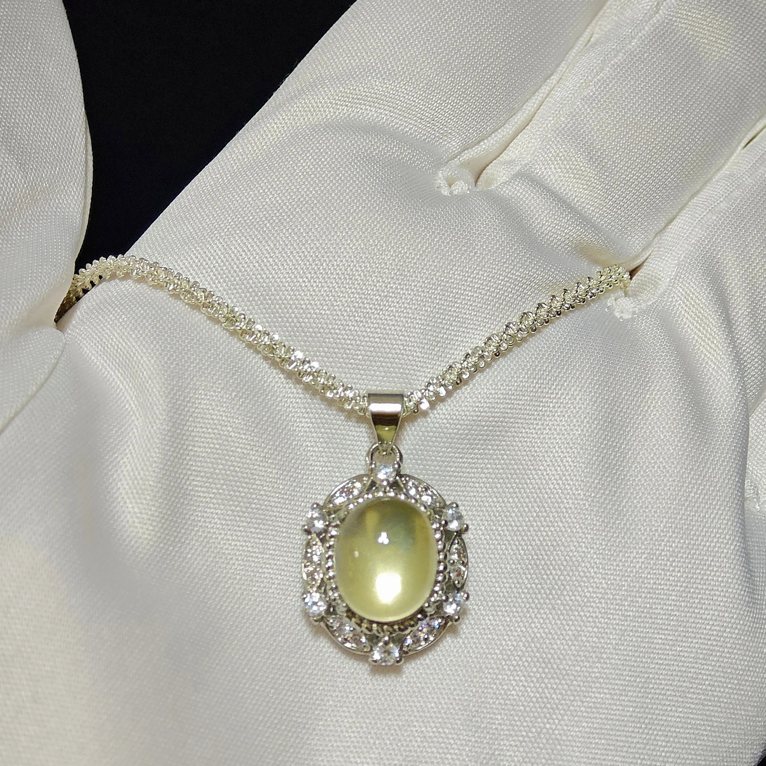 Citrine · Abundance Crown Pendant Citrine · Abundance Crown Pendant — 15mm natural honey-gold Citrine cabochon set in pave diamond halo by Meruisa Crystal