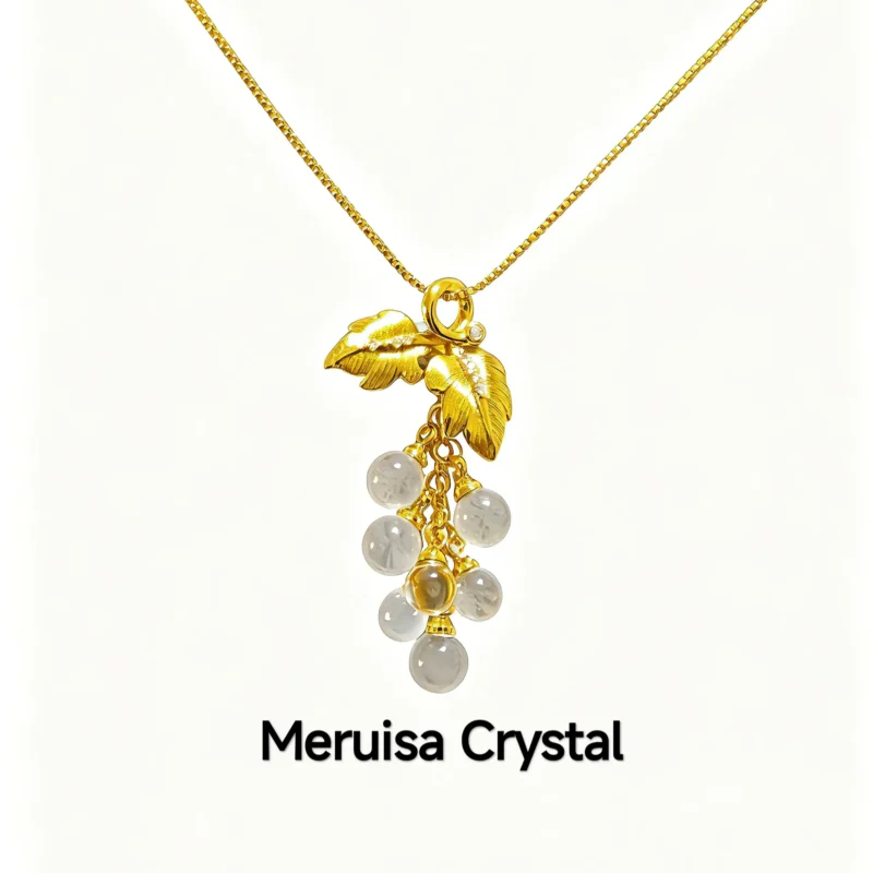 Clear Quartz Abundance & Clarity Grapevine Pendant — a cluster of natural clear quartz beads hanging from gold-plated sterling silver leaves with cubic zirconia accents, Meruisa Crystal