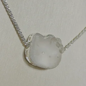 Clear Quartz · Ampification Hello Kitty Pendant — natural 23.9mm sculpted clear quartz with frosted finish and faceted details by Meruisa Crystal
