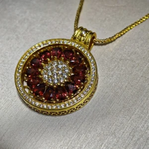 Garnet Guidance Pendant — natural Garnet compass pendant with zirconia outer ring and pave crystal center by Meruisa Crystal
