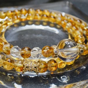 Double Wrap Golden Citrine & Clear Quartz Bracelet — double‑wrap bracelet with 11.7mm Clear Quartz crown, 6.3mm Golden Citrine beads, and faceted Clear Quartz accents by Meruisa Crystal