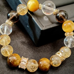 Prosperity & Confidance Bracelet — mixed Golden Citrine, Tiger's Eye, Smoky Quartz, Clear Quartz, and Golden Tiger's Eye beads with diamond-cut spacers and 14.2mm Clear Quartz crown by Meruisa Crystal
