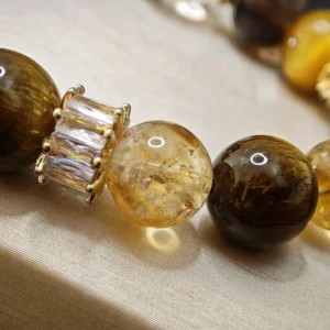 Prosperity & Confidance Bracelet — mixed Golden Citrine, Tiger's Eye, Smoky Quartz, Clear Quartz, and Golden Tiger's Eye beads with diamond-cut spacers and 14.2mm Clear Quartz crown by Meruisa Crystal