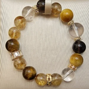Prosperity & Confidance Bracelet — mixed Golden Citrine, Tiger's Eye, Smoky Quartz, Clear Quartz, and Golden Tiger's Eye beads with diamond-cut spacers and 14.2mm Clear Quartz crown by Meruisa Crystal