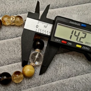 Prosperity & Confidance Bracelet — mixed Golden Citrine, Tiger's Eye, Smoky Quartz, Clear Quartz, and Golden Tiger's Eye beads with diamond-cut spacers and 14.2mm Clear Quartz crown by Meruisa Crystal