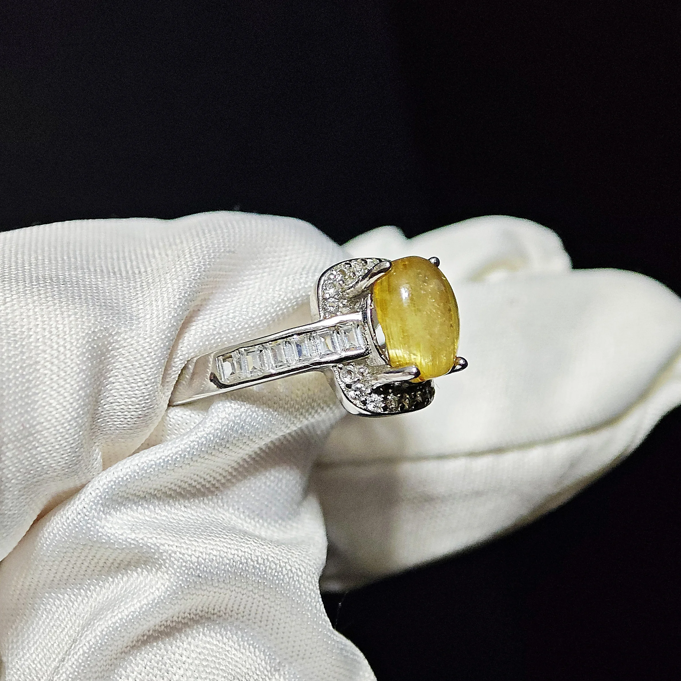 Golden Rutilated Quartz · Prosperity Ring Golden Light Rutilated Quartz Prosperity Ring — natural cabochon Golden Rutilated Quartz with golden rutile strands set in sterling silver with square-cut accent stones by Meruisa Crystal