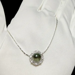 Green Phantom Quartz · Growth & Manifestation Pendant — silver plated pendant with micro‑pave diamond rays and natural green phantom quartz center by Meruisa Crystal