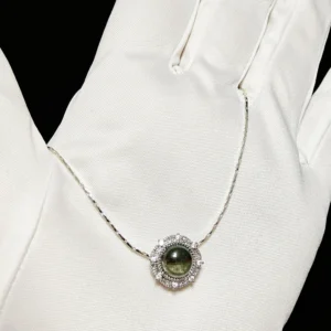 Green Phantom Quartz · Growth & Manifestation Pendant — silver plated pendant with micro‑pave diamond rays and natural green phantom quartz center by Meruisa Crystal
