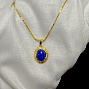 Golden Sands Lapis Lazuli Oval Pendant — gold-plated silver oval pendant with golden sand textured rim, micro-pave diamond halo, and natural lapis lazuli center by Meruisa Crystal