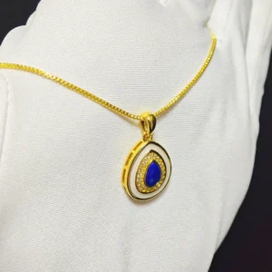 Mystic Tear Lapis Lazuli Waterdrop Pendant — waterdrop-cut natural Lapis Lazuli set in gold-tone frame with diamond halo and white resin outer layer by Meruisa Crystal