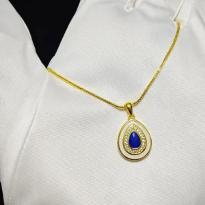 Mystic Tear Lapis Lazuli Waterdrop Pendant — waterdrop-cut natural Lapis Lazuli set in gold-tone frame with diamond halo and white resin outer layer by Meruisa Crystal