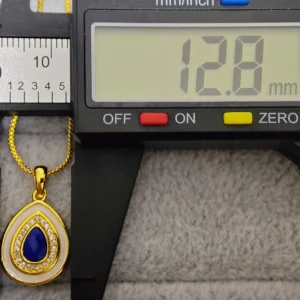 Mystic Tear Lapis Lazuli Waterdrop Pendant — waterdrop-cut natural Lapis Lazuli set in gold-tone frame with diamond halo and white resin outer layer by Meruisa Crystal