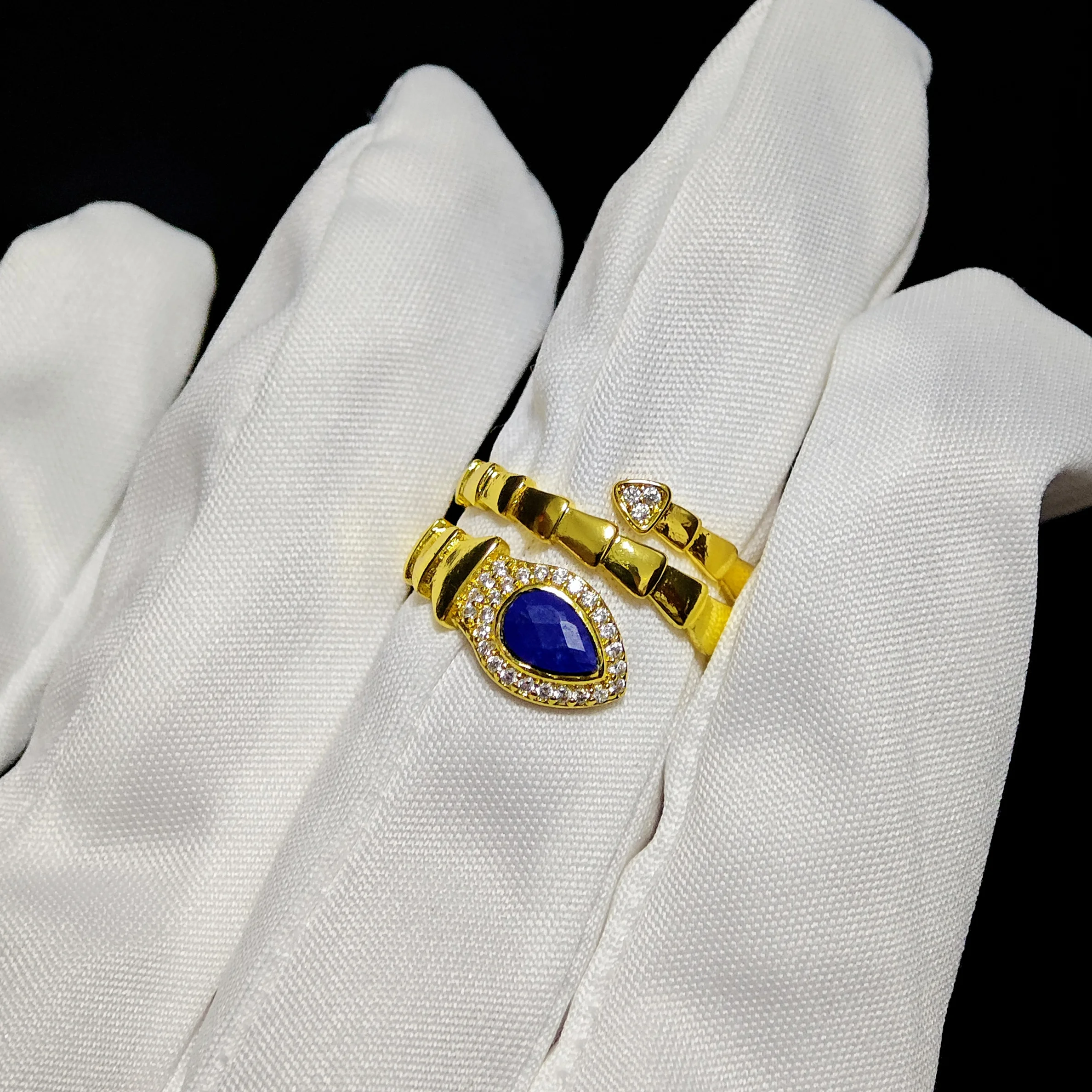 Lapis Lazuli · Intuition & Protection Serpent Ring Lapis Lazuli · Intuition & Protection Serpent Ring — waterdrop-cut natural Lapis Lazuli in gold-plated copper serpent setting with pave diamond head and tail accents by Meruisa Crystal