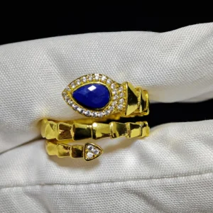 Lapis Lazuli · Intuition & Protection Serpent Ring — waterdrop-cut natural Lapis Lazuli in gold-plated copper serpent setting with pave diamond head and tail accents by Meruisa Crystal
