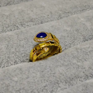 Lapis Lazuli · Intuition & Protection Serpent Ring — waterdrop-cut natural Lapis Lazuli in gold-plated copper serpent setting with pave diamond head and tail accents by Meruisa Crystal