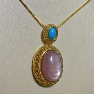 Lepidolite · Serenity Blue Apatite Pendant — 19.7mm natural Lepidolite cabochon in openwork gold-tone frame with Blue Apatite accent by Meruisa Crystal