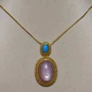 Lepidolite · Serenity Blue Apatite Pendant — 19.7mm natural Lepidolite cabochon in openwork gold-tone frame with Blue Apatite accent by Meruisa Crystal