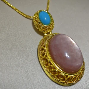 Lepidolite · Serenity Blue Apatite Pendant — 19.7mm natural Lepidolite cabochon in openwork gold-tone frame with Blue Apatite accent by Meruisa Crystal