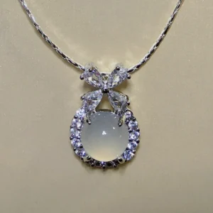 Milky Chalcedony Pendant — natural milky chalcedony with zirconia bow and halo by Meruisa Crystal
