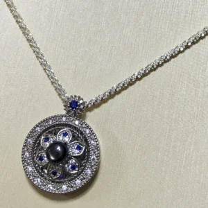 Obsidian · Guidance Compass Pendant/Necklace — compass pendant with natural Black Obsidian center, pave diamond halo, and Sapphire accents by Meruisa Crystal