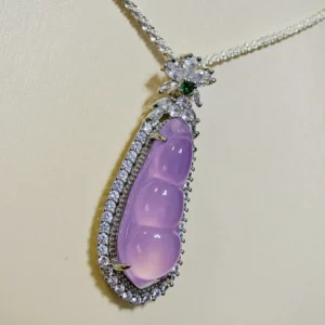 Purple Chalcedony Pea Pendant — natural purple chalcedony pea pod with full zirconia accents on silver setting by Meruisa Crystal