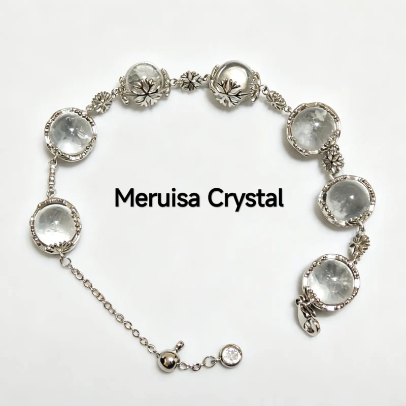 Clear Quartz Healer & Clarity Snowflake Bracelet — natural quartz spheres and vintage snowflake details set in silver-plated copper by Meruisa Crystal