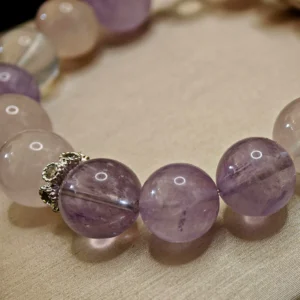 Trio of Light Bracelet — 10.9mm beaded bracelet with natural Milky Quartz, Rose Quartz, and Lavender Amethyst, featuring a 13.1mm Lavender Amethyst crown bead by Meruisa Crystal