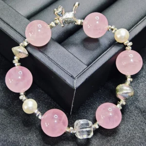 Whisker & Blush Rose Quartz Bracelet — 14.4mm natural rose quartz beads with shell pearl accents, square clear quartz, and silver cat charm by Meruisa Crystal