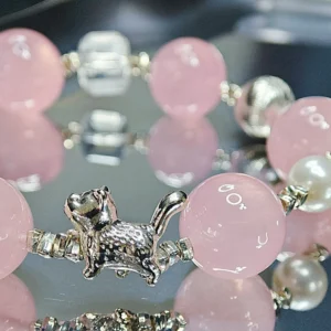 Whisker & Blush Rose Quartz Bracelet — 14.4mm natural rose quartz beads with shell pearl accents, square clear quartz, and silver cat charm by Meruisa Crystal