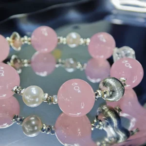 Whisker & Blush Rose Quartz Bracelet — 14.4mm natural rose quartz beads with shell pearl accents, square clear quartz, and silver cat charm by Meruisa Crystal