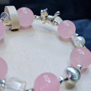 Whisker & Blush Rose Quartz Bracelet — 14.4mm natural rose quartz beads with shell pearl accents, square clear quartz, and silver cat charm by Meruisa Crystal