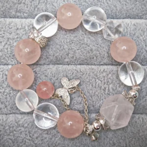 Wild Bloom Bracelet — mixed Rose Quartz rounds, Clear Quartz free‑forms, and White Phantom crown with silver butterfly charm by Meruisa Crystal