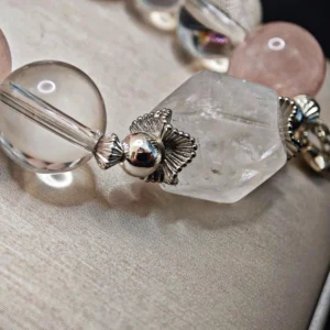Wild Bloom Bracelet — mixed Rose Quartz rounds, Clear Quartz free‑forms, and White Phantom crown with silver butterfly charm by Meruisa Crystal