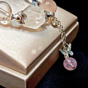 Wild Bloom Bracelet — mixed Rose Quartz rounds, Clear Quartz free‑forms, and White Phantom crown with silver butterfly charm by Meruisa Crystal