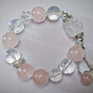 Wild Bloom Bracelet — mixed Rose Quartz rounds, Clear Quartz free‑forms, and White Phantom crown with silver butterfly charm by Meruisa Crystal